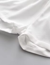 ⁦طقم بناتي أنيق ومثالي للفتيات الصغيرات مكون من بلوزة بدون أكمام وشورت مع حزام بتصميم عصري⁩ - الصورة ⁦7⁩